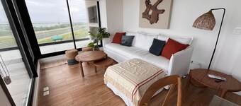 Apartamento con Terraza Frente a la Playa. Parada 27 Mansa