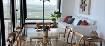 Apartamento con terraza frente a la playa. Parada 27 mansa