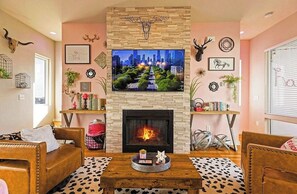 Smart TV, fireplace, table tennis, books