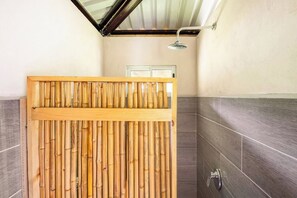 Shower, towels, soap, toilet paper