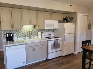 Fridge, microwave, oven, stovetop - Tranquil-Lakeside-Walk-in-Fall Creek Getaway with Cozy Updates and New Rates. (Branson)