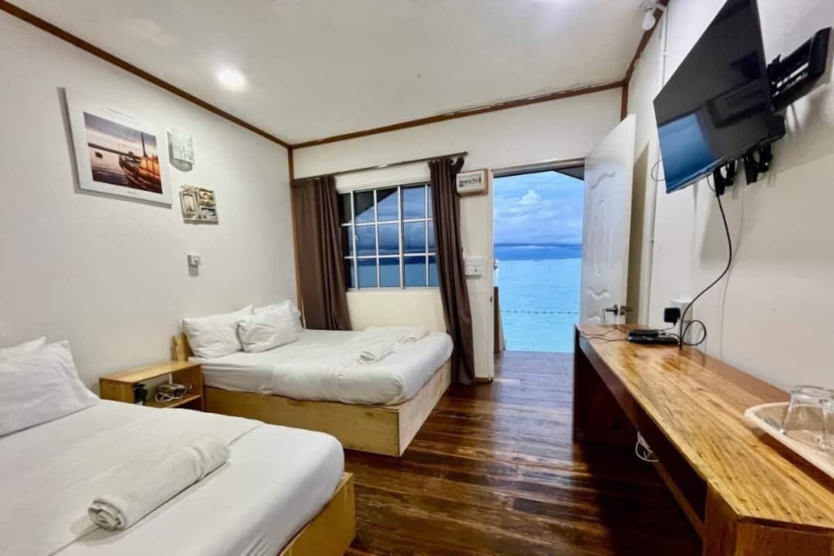 Tremannsrom – superior, sjøutsikt | Sengetøy av topp kvalitet og individuelt innredet