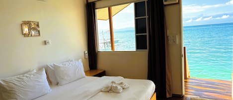 Deluxe Room, 1 King Bed, Sea View | Premium bedding, individually furnished, laptop workspace