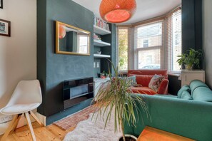 Ferienhaus, Terrasse | Wohnbereich | Fernseher