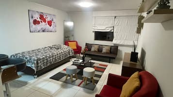 Apartemen Ekonomi | Area keluarga | Smart TV, Netflix, film tayangan perdana, dan layanan streaming