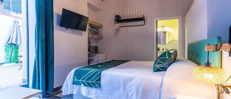 1 slaapkamer, een strijkplank/strijkijzer, internet, beddengoed