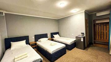 Economy Triple Room | 1 bedroom, desk, free WiFi