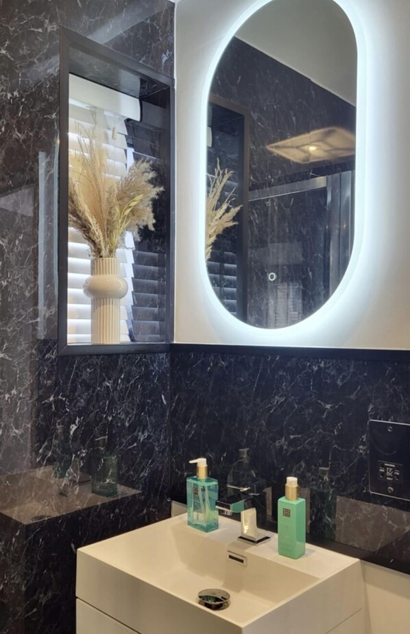 Hair dryer, towels, soap, toilet paper