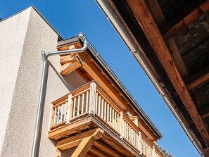 Enjoy a balcony with a simple railing, perfect for taking in the views.