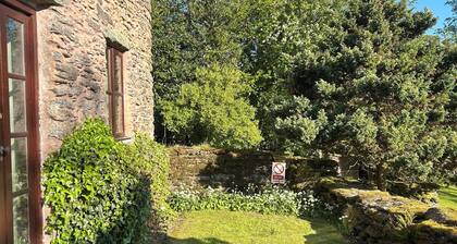 Wonderful secluded cottage with outstanding views over the Welsh Dee Valley.
