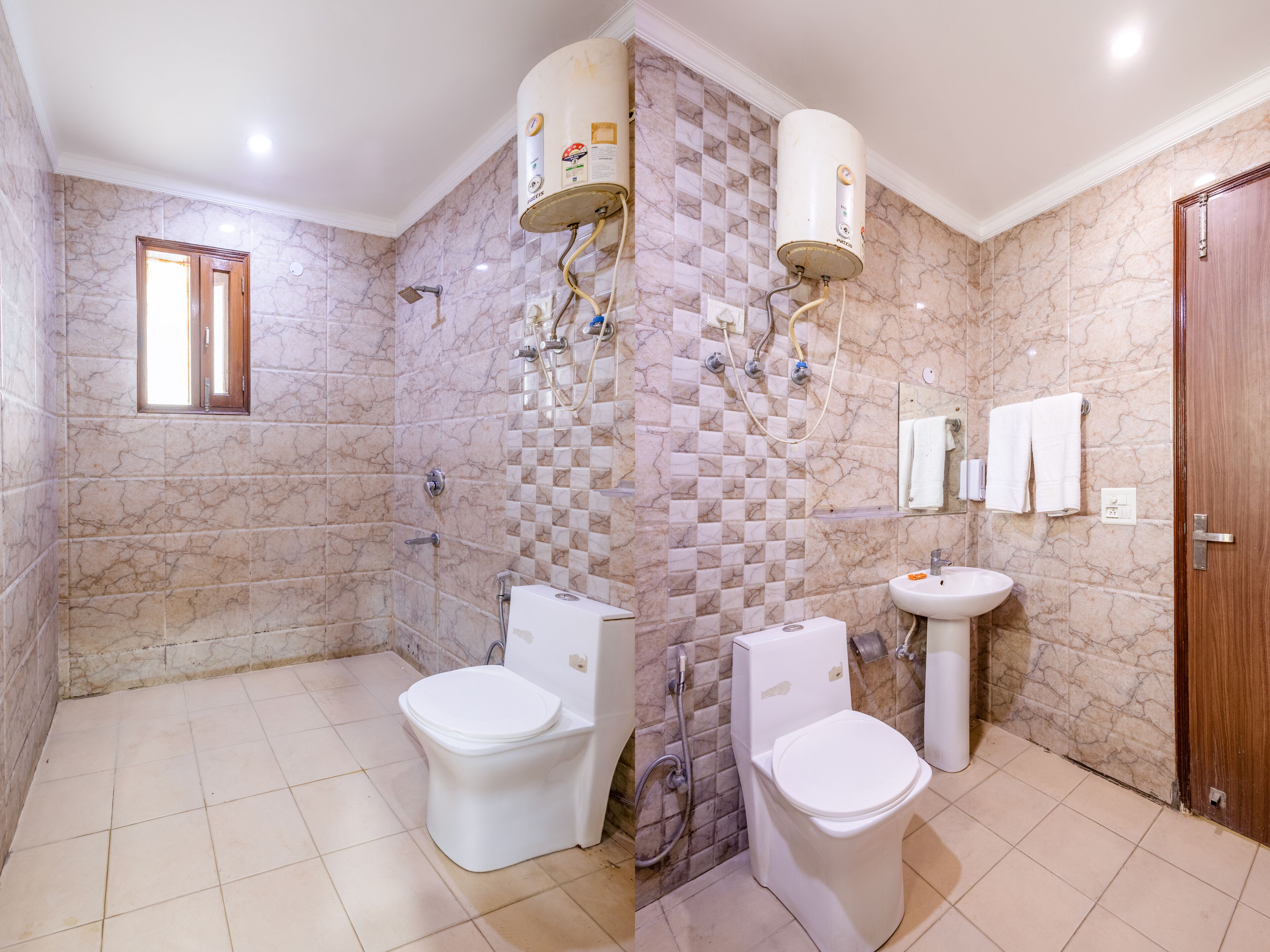A bathroom with two toilets, a sink, a shower, and a window.