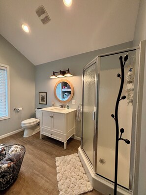 Shower, hair dryer, towels, soap