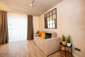 Penthouse, Sea View | Living area | TV