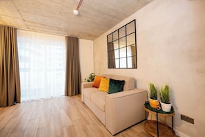 Penthouse, Sea View | Living area | TV
