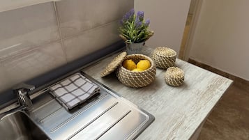 Standard Apartment, Patio, Pool View | Private kitchen