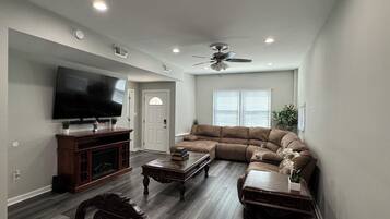 Smart TV, fireplace, books