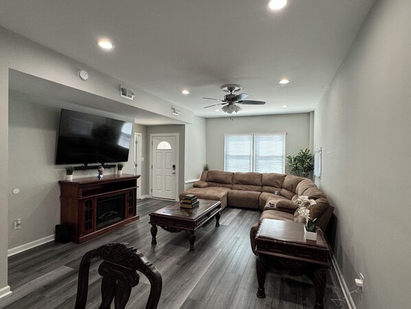 Smart TV, fireplace, books