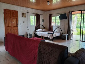 Family Studio, Pool View | Desk, laptop workspace, blackout drapes, iron/ironing board - Hotel Cabana Casita La Ermita (San Carlos)