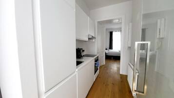 Apartment, 2 Bedrooms | Private kitchen | Fridge, microwave, oven, stovetop
