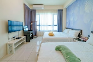 A hotel room with two beds, a TV, a desk, and a window with curtains. - Jenny Inn (Yilan)