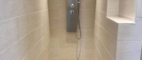 Shower, towels, toilet paper