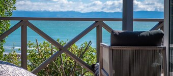 Enjoy this gorgeous cottage in island paradise with stunning ocean views