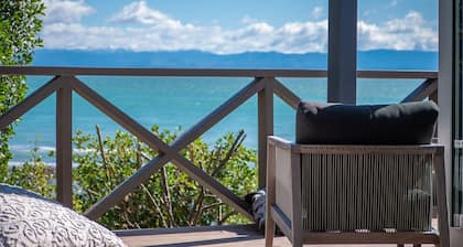 Enjoy this gorgeous cottage in island paradise with stunning ocean views