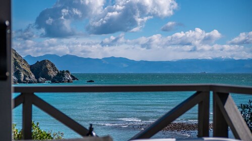 Enjoy this gorgeous cottage in island paradise with stunning ocean views