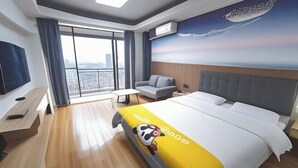 A hotel room with a bed, a sofa, a desk, and a large window with a city view. - Sunshine Harbor Hotel (Xi'an Sunshine City) (Xi'an)