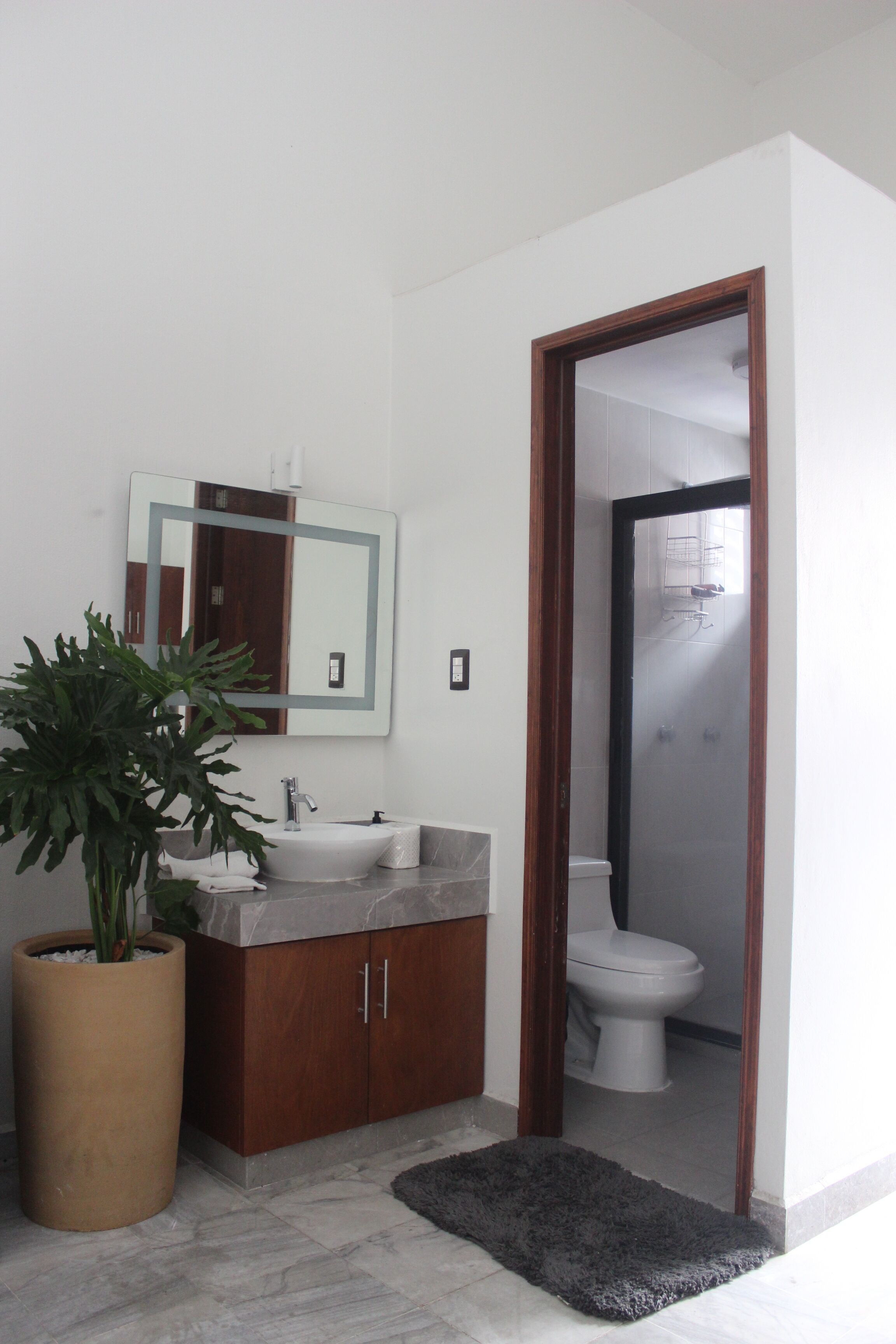 Suite, 2 Double Beds | Bathroom | Shower, hair dryer, heated floors, towels