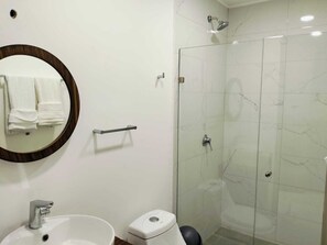 Shower, towels, soap, shampoo