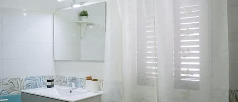 Hair dryer, towels, soap, toilet paper
