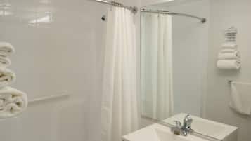 Combined shower/tub, hair dryer, soap, shampoo