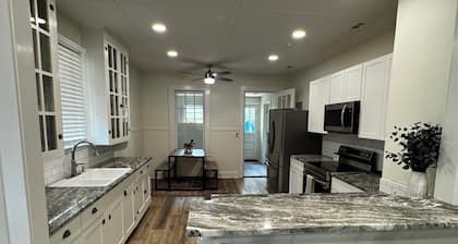 Charming 2-bedroom lake front cottage in lovely Lake Park Georgia.