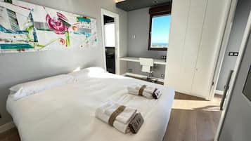 3 habitaciones, tabla de planchar con plancha, wifi y ropa de cama