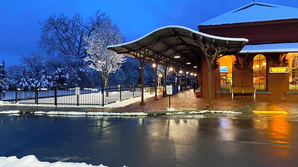 A covered outdoor area with benches and a shelter, surrounded by snow and a frozen body of water. - HollyKissHudsonValley Renovated 1900 Lodge, Full House. (Catskill)