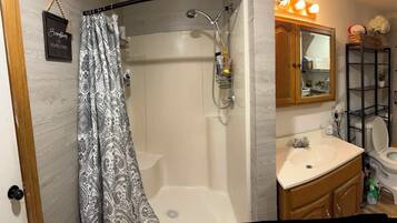 Hair dryer, towels, soap, toilet paper