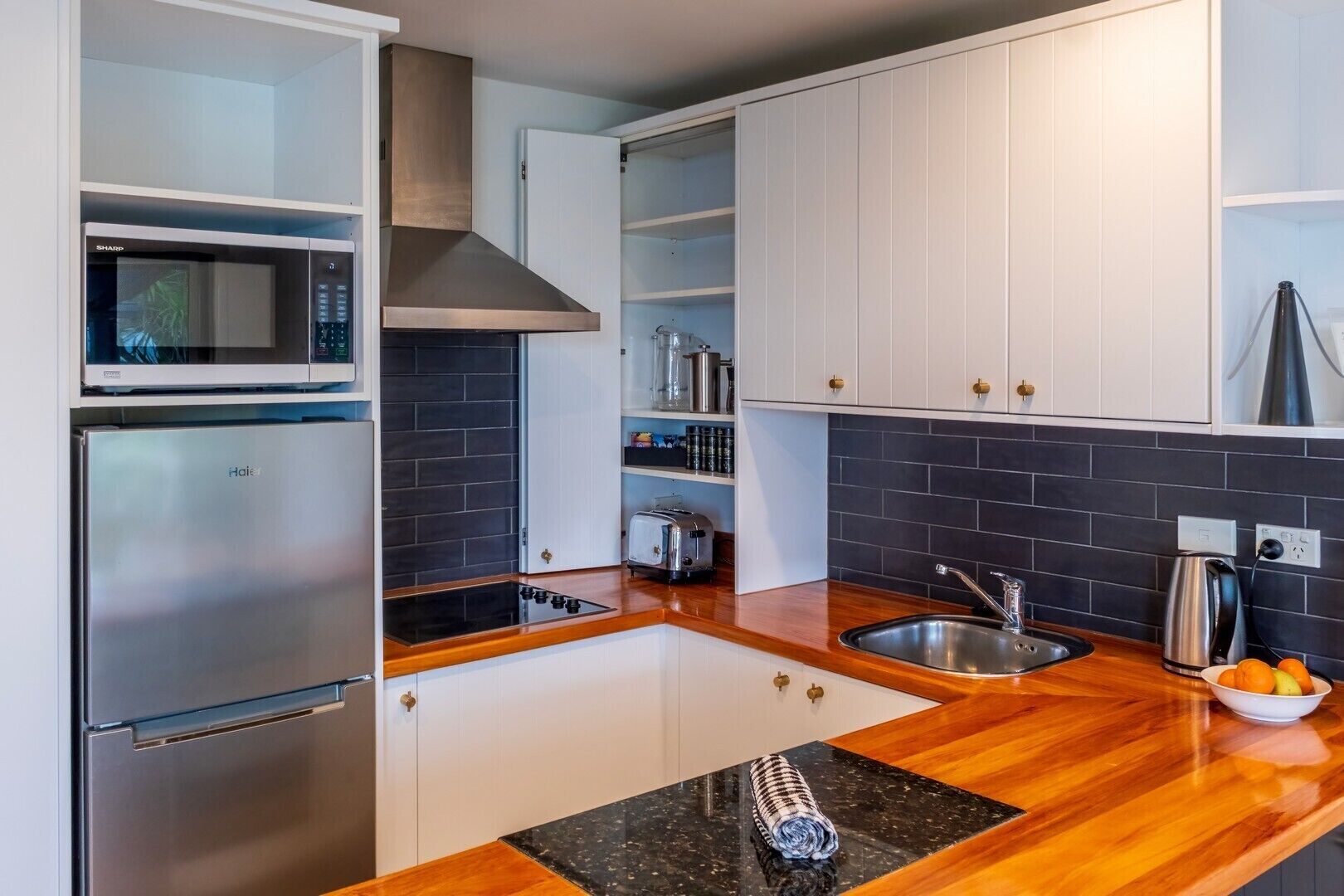 Seaview - Upstairs One Bedroom Apartment | Private kitchen | Full-size fridge, microwave, oven, stovetop