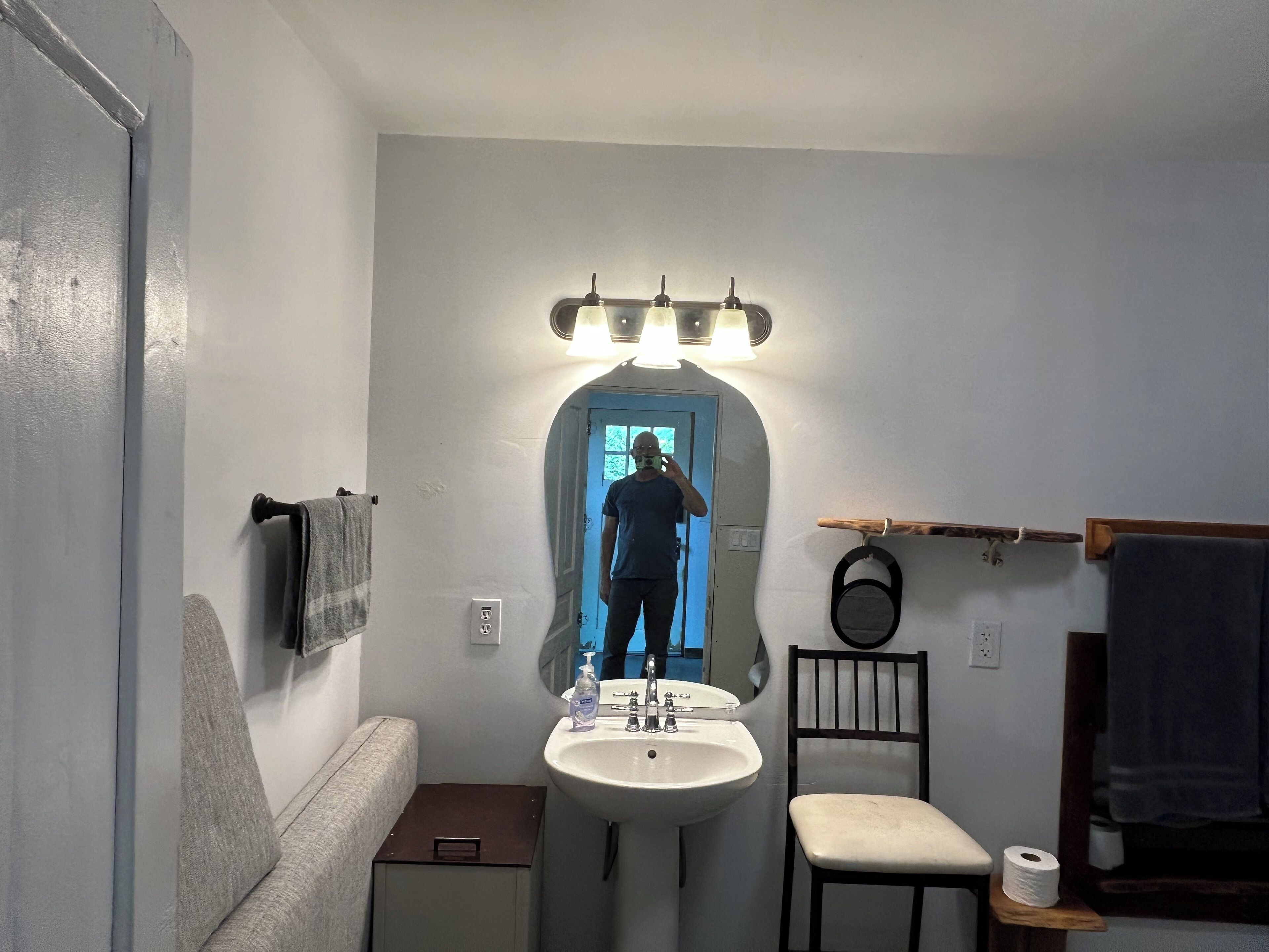 Bidet, towels, soap, toilet paper