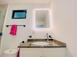 Hair dryer, towels, soap, toilet paper