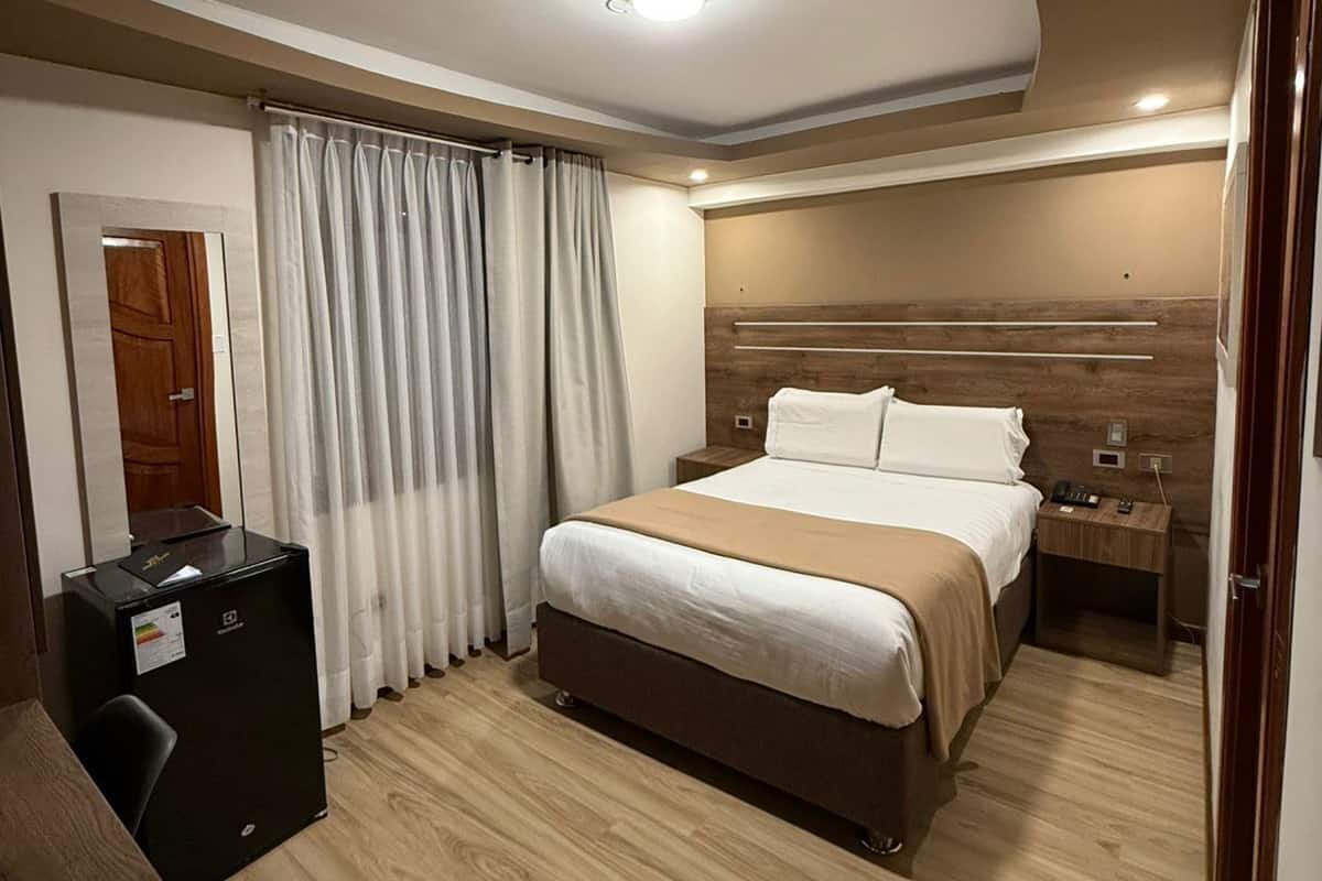 Deluxe Room, 1 Queen Bed | 1 bedroom, down duvets, desk, free WiFi