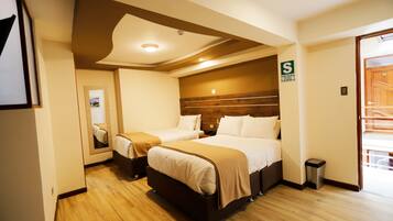 Family Room, Multiple Beds | Down comforters, desk, free WiFi