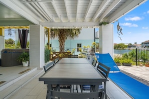 Outdoor dining - 3BR Waterfront • Hot Tub + Dock • Kayaks • Bikes (Hernando Beach)