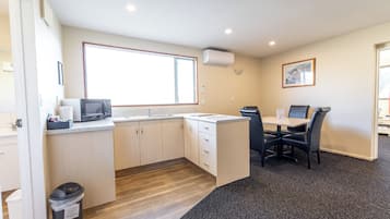Premium One Bedroom Suite | Private kitchen | Mini-fridge, microwave, stovetop, cookware/dishes/utensils
