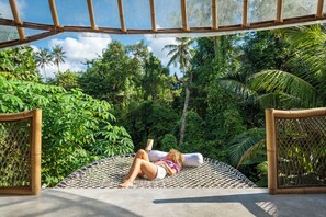 35-inch flat-screen TV with satellite channels - Bamboo Dream Villa by Betterplace (Ubud)