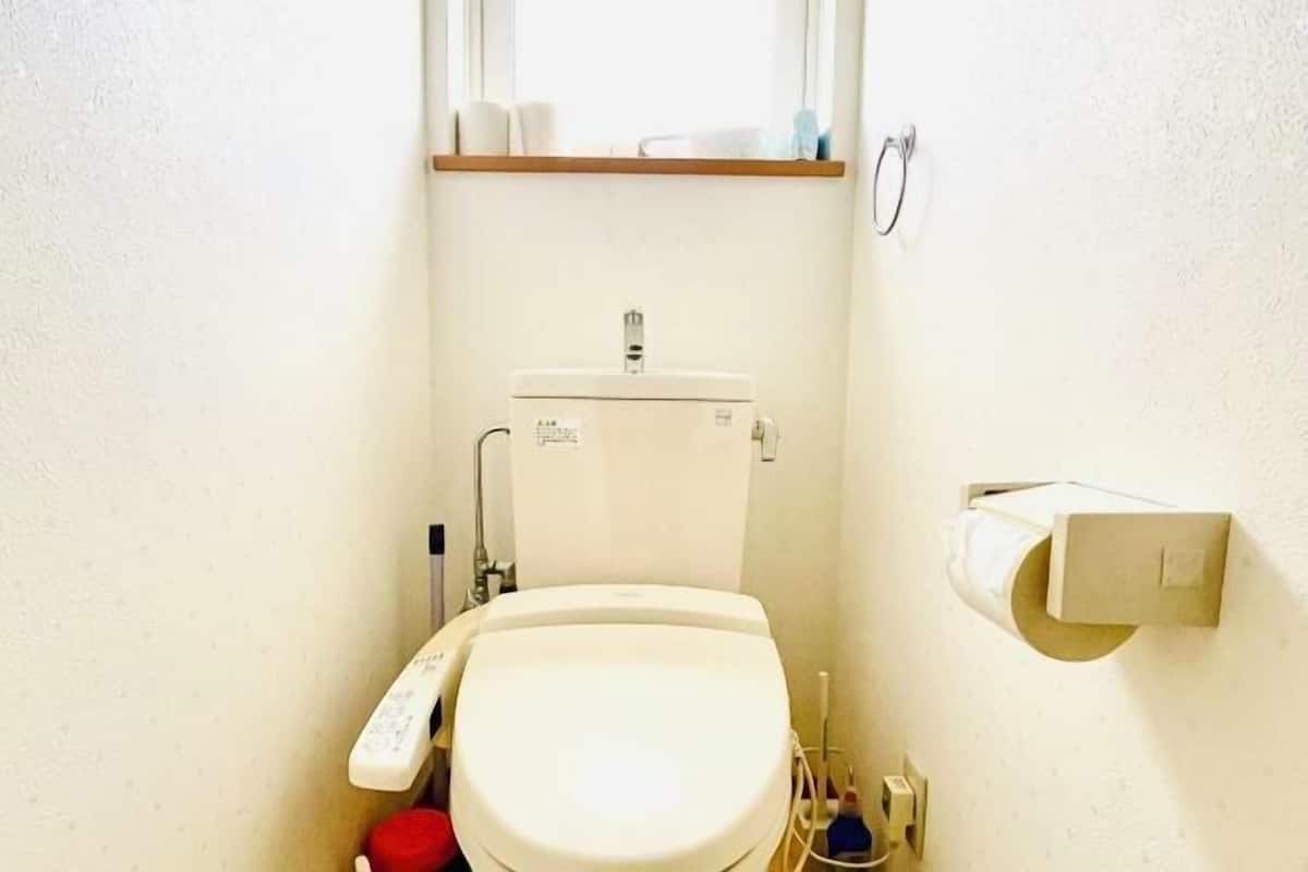 Bathroom | Combined shower/bathtub, free toiletries, hair dryer, slippers