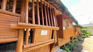 A wooden structure with a sign reading "KUBO OGOT #2".
