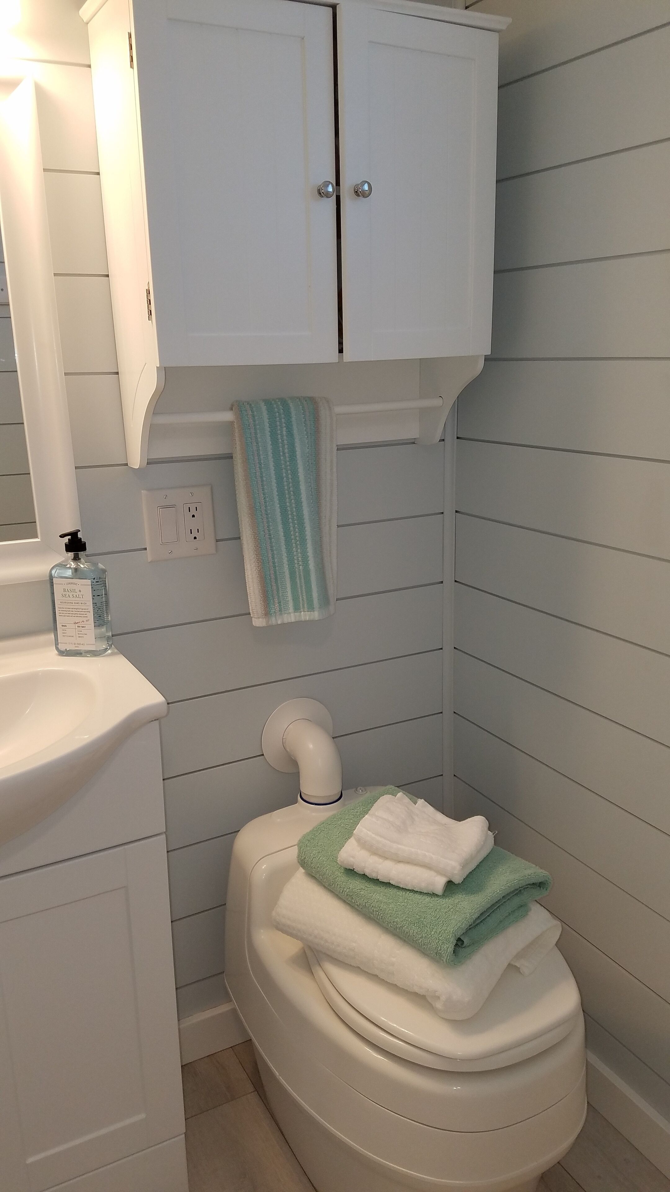 Eco-friendly toiletries, hair dryer, towels, soap