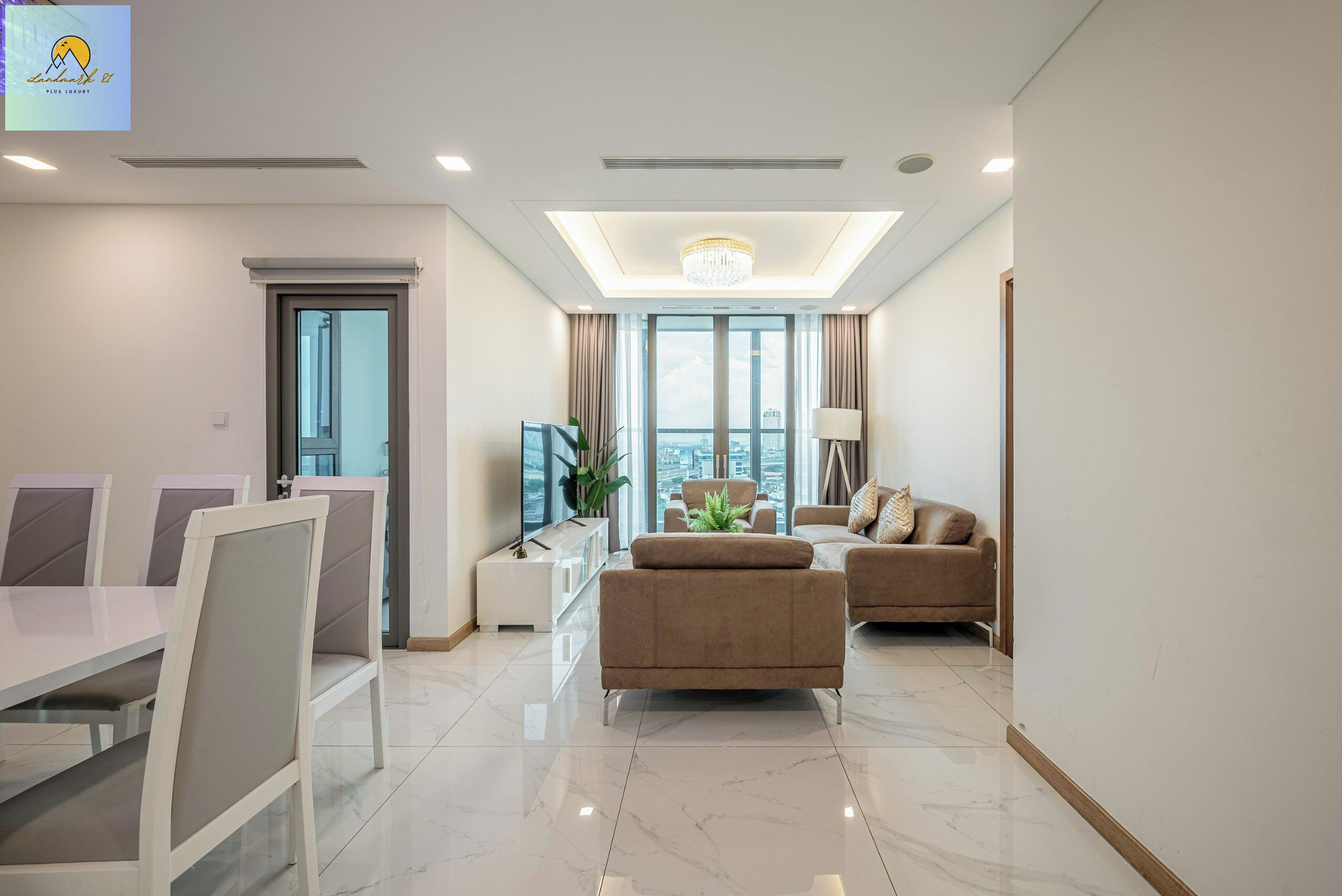 Signature Apartment, 4 Bedrooms, Balcony, City View | Living area | 42-inch flat-screen TV with cable channels