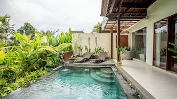 Vila standard, vista para o jardim | Comodidades do quarto